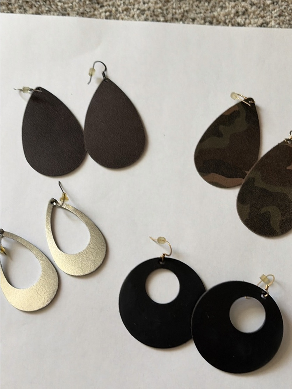 Nickel and suede brand earrings